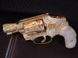 Smith & Wesson Model 40,hammerless,grip safety,Jeff Flannery master engraved 100%+,24K plated,Pearlite grips,2
