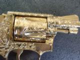 Smith & Wesson Model 36 no dash,master scroll engraved by Jeff Flannery,24K plated,1
3/4