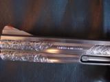 Smith & Wesson 686 no dash,master engraved by Valenya,357 mag,6