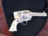 General George Patton Commemorative,from AHF,made by Uberti,fully engraved & silver plated,45LC,SAA,unfired,hang tags,certificate,letters,etc.awesome
- 12 of 12