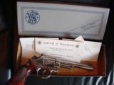 Smith & Wesson 19-4,high polished nickel,master engraved,6",357 Magnum,original box,manual,etc,checkered wood target grips,adj.site,1978 - 7 of 12