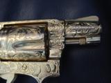 Smith & Wesson model 36 no dash,24K plated,fully 100%+ master engraved by Flannery,real MOP grips,38 spl,1 3/4