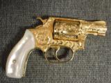 Smith & Wesson model 36 no dash,24K plated,fully 100%+ master engraved by Flannery,real MOP grips,38 spl,1 3/4