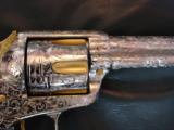 Colt SAA 2nd Gen,NRA Centennial,1971,full master engraved by Robert Valade with 24K accents,Sambar Stag,357mag,5 1/2