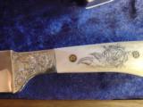 Ruger New Model Blackhawk,master engraved,scrimshaw bonded ivory grips,engraved knife with caribou antler grips,engraved,pres case,boxes etc 357 mag - 7 of 12