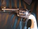 Colt Bisley 38WCF,1903,refinished nickel & master engraved by Clint Finley,real Ivory grips,4 3/4