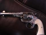 Colt Bisley 38WCF,1903,refinished nickel & master engraved by Clint Finley,real Ivory grips,4 3/4