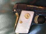 Colt 1908 Vest Pocket 25 caliber,made in 1918,fully refinished in blue with gold accents,Pearlite grips,fully Flannery engraved-awesome showpiece !! - 3 of 12