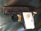 Colt 1908 Vest Pocket 25 caliber,made in 1918,fully refinished in blue with gold accents,Pearlite grips,fully Flannery engraved-awesome showpiece !! - 4 of 12