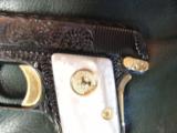 Colt 1908 Vest Pocket 25 caliber,made in 1918,fully refinished in blue with gold accents,Pearlite grips,fully Flannery engraved-awesome showpiece !! - 5 of 12