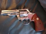 Colt Trooper MK III,4",357 magnum,polished mirror nickel finish,real showpiece,Safariland leather holster,possibly around 1969 - 1 of 11