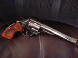 Smith & Wesson Model 29-2, 44 Magnum,8 3/8",bright high polished nickel,Bianchi leather holster,wood grips,around 1969,a nice clean showpiece !! - 9 of 12