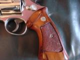Smith & Wesson Model 29-2, 44 Magnum,8 3/8",bright high polished nickel,Bianchi leather holster,wood grips,around 1969,a nice clean showpiece !! - 2 of 12