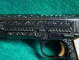 Colt 1911,made around 1919,fully deep relief master engraved with gold accents,real MOP grips,with carved lady,awesome masterpiece,US Army model - 4 of 12