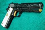 Colt 1911,made around 1919,fully deep relief master engraved with gold accents,real MOP grips,with carved lady,awesome masterpiece,US Army model - 2 of 12