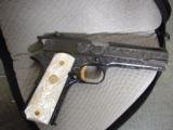 Colt 1911,made around 1919,fully deep relief master engraved with gold accents,real MOP grips,with carved lady,awesome masterpiece,US Army model - 11 of 12