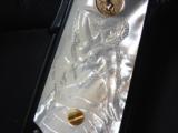 Colt 1911,made around 1919,fully deep relief master engraved with gold accents,real MOP grips,with carved lady,awesome masterpiece,US Army model - 12 of 12