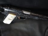 Colt 1911,made around 1919,fully deep relief master engraved with gold accents,real MOP grips,with carved lady,awesome masterpiece,US Army model - 10 of 12