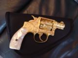 Smith & Wesson Pre Model 10,100%+ Master engrave by Flannery,24K gold plated,2",38spl,real MOP grips,a work of art - 1 of 12