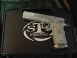 STI 100th Anniversary 2 gun set,45acp,#287 of 500,Legend & GI models,in fitted wood pres case,matching serial numbers,unfired with all boxes,manuals - 8 of 12