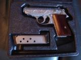 Walther PPK/Interarms 380,fully engraved by Flannery,polished stainless,custom wood grips,1989,with box,manual & test target,a real work of art !!! - 1 of 15
