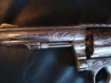 Smith & Wesson, model 10-6,fully engraved by Flannery,& fully bright nickel plated,Pearlite grips,4