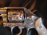 Smith & Wesson, model 10-6,fully engraved by Flannery,& fully bright nickel plated,Pearlite grips,4