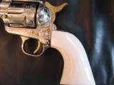 COLT SAA,125th ANN.master engraved by Brian Mears,nickel plated ,gold accents,real ivory grips,7 1/2