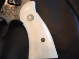 Smith & Wesson 28-2,custom engraved,high gloss blued,aged real ivory grips,6