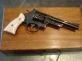 Smith & Wesson 28-2,custom engraved,high gloss blued,aged real ivory grips,6