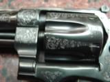 Smith & Wesson 28-2,custom engraved,high gloss blued,aged real ivory grips,6