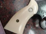 Smith & Wesson 28-2,custom engraved,high gloss blued,aged real ivory grips,6
