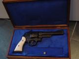 Smith & Wesson 28-2,custom engraved,high gloss blued,aged real ivory grips,6
