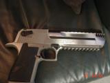 Desert Eagle -Magnum Research -RARE all stainless with built in COMP,& 2 rails,50AE,hand cannon,low recoil,new in box,unfired,all papers & manual,DVD
- 1 of 14