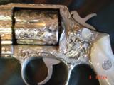 Smith & Wesson,model 10-8,fully engraved by Flannery & refinished in bright nickel,4