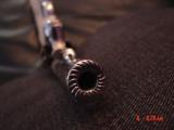 Smith & Wesson,model 10-8,fully engraved by Flannery & refinished in bright nickel,4