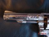 Smith & Wesson,model 10-8,fully engraved by Flannery & refinished in bright nickel,4