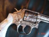 Smith & Wesson,model 10-8,fully engraved by Flannery & refinished in bright nickel,4