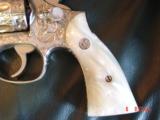 Smith & Wesson,model 10-8,fully engraved by Flannery & refinished in bright nickel,4