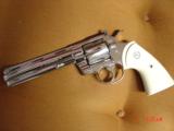Colt Python fully refinished in bright nickel,Bonded Ivory grips,6