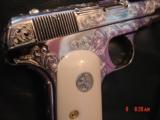 Colt 1903, 32 calibur,fully engraved,& refinished in bright nickel,bonded ivory grips,hammerless,grip safety,made in 1916,an awesome show piece !! - 4 of 15
