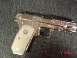 Colt 1903, 32 calibur,fully engraved,& refinished in bright nickel,bonded ivory grips,hammerless,grip safety,made in 1916,an awesome show piece !! - 14 of 15