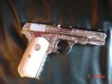 Colt 1903, 32 calibur,fully engraved,& refinished in bright nickel,bonded ivory grips,hammerless,grip safety,made in 1916,an awesome show piece !! - 3 of 15