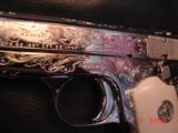Colt 1903, 32 calibur,fully engraved,& refinished in bright nickel,bonded ivory grips,hammerless,grip safety,made in 1916,an awesome show piece !! - 8 of 15
