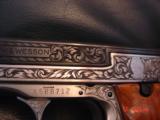 Ben Shostle Master engraved deep relief Smith & Wesson,model 41,2 tone,wood grips,signed Shostle over serial #,very rare one of a kind work of art !! - 3 of 15