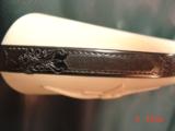 Colt SAA 3rd Gen.,45LC,master engraved by William C Severson,reblued,gold line inlays,steerhead with snake,real carved ivory grips,4 1/2