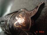 Colt SAA 3rd Gen.,45LC,master engraved by William C Severson,reblued,gold line inlays,steerhead with snake,real carved ivory grips,4 1/2