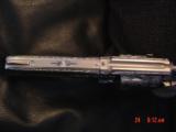 Smith & Wesson model 10-6,fully engraved by Flannery,& just refinished in bright nickel,4