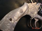 Smith & Wesson model 10-6,fully engraved by Flannery,& just refinished in bright nickel,4