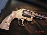 Smith & Wesson model 10-6,fully engraved by Flannery,& just refinished in bright nickel,4